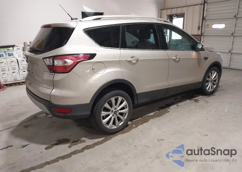 2017 Ford Escape Titanium z USA, uszkodzony, nr VIN 1FMCU0J92HUD90761